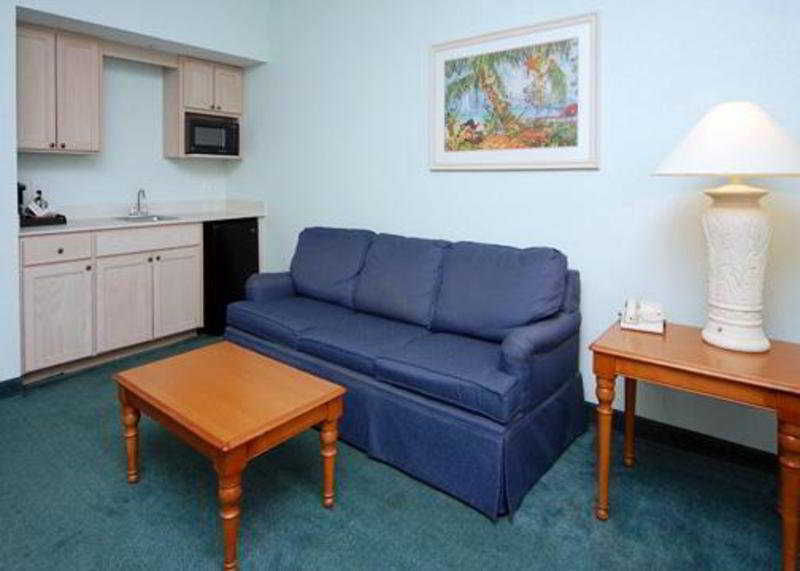 Cocoa Beach Suites Hotel Стая снимка